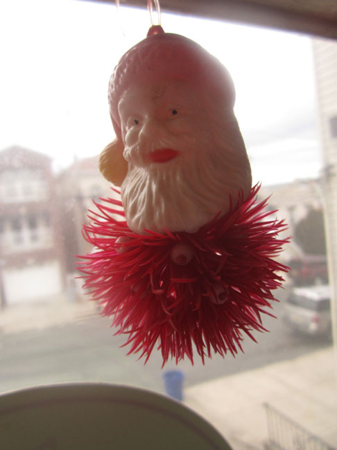 vintage-red-plastic-christmas-santa-ornament